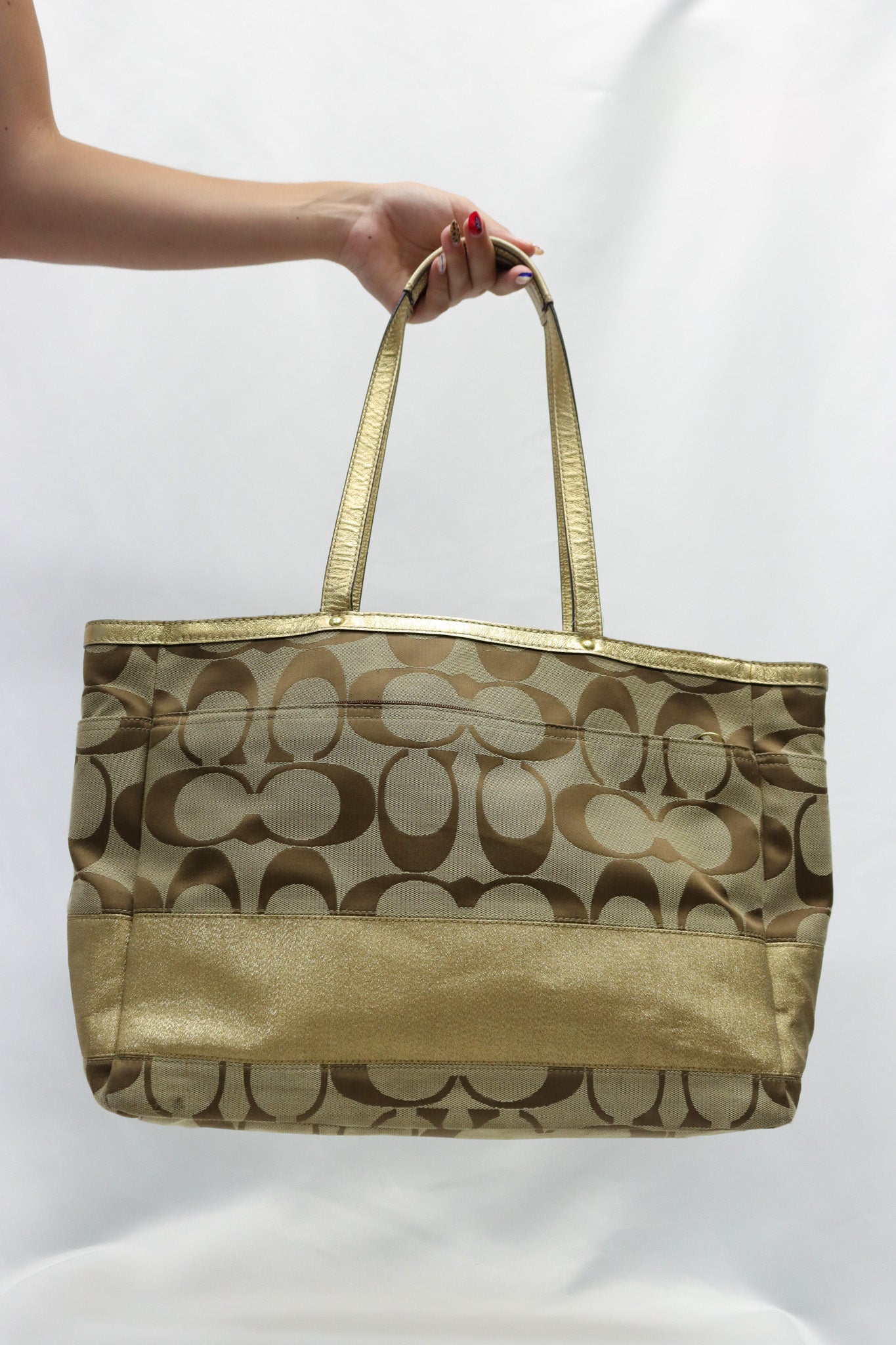 Coach Gold Diaper Bag