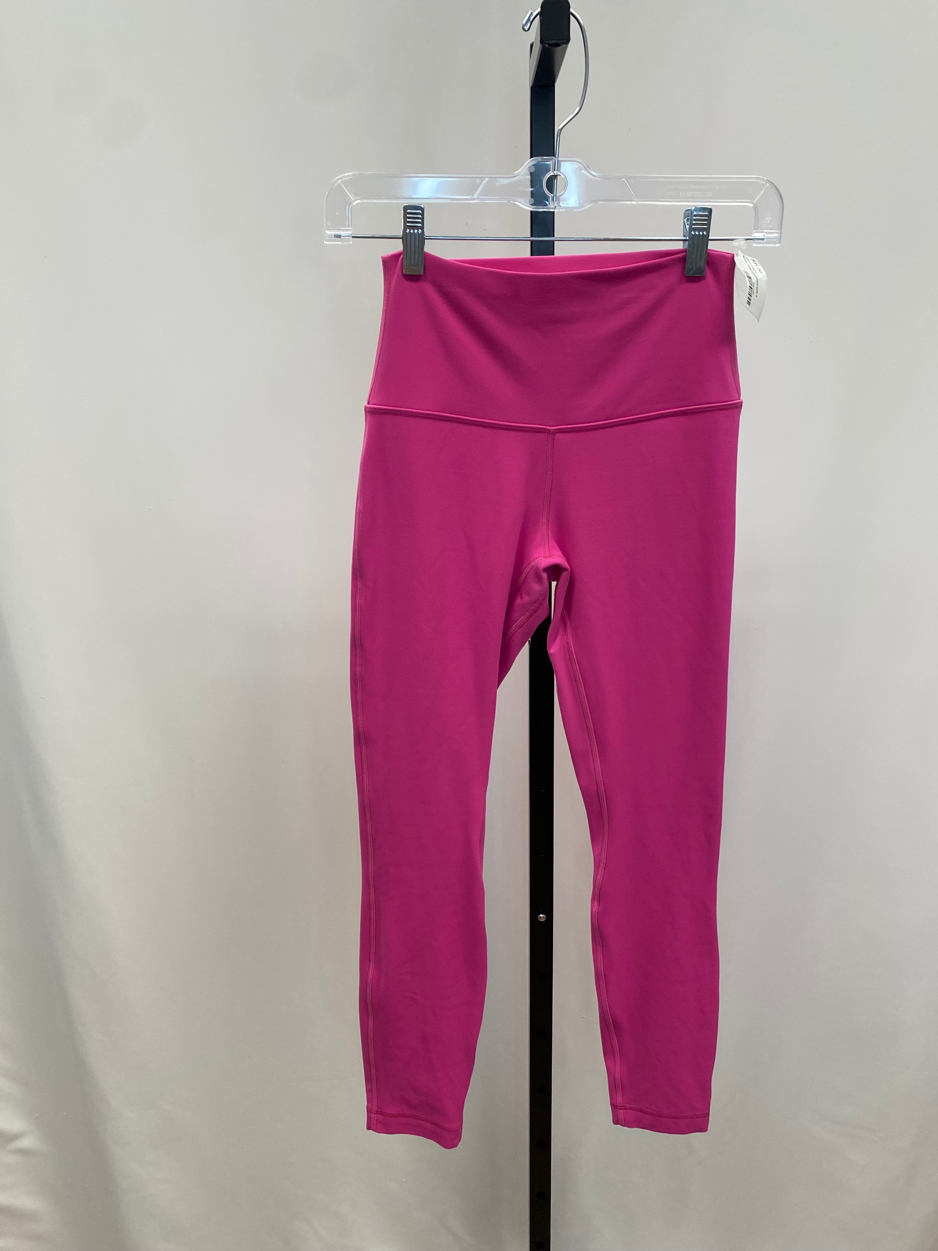 Lululemon sonic pink leggings size 4