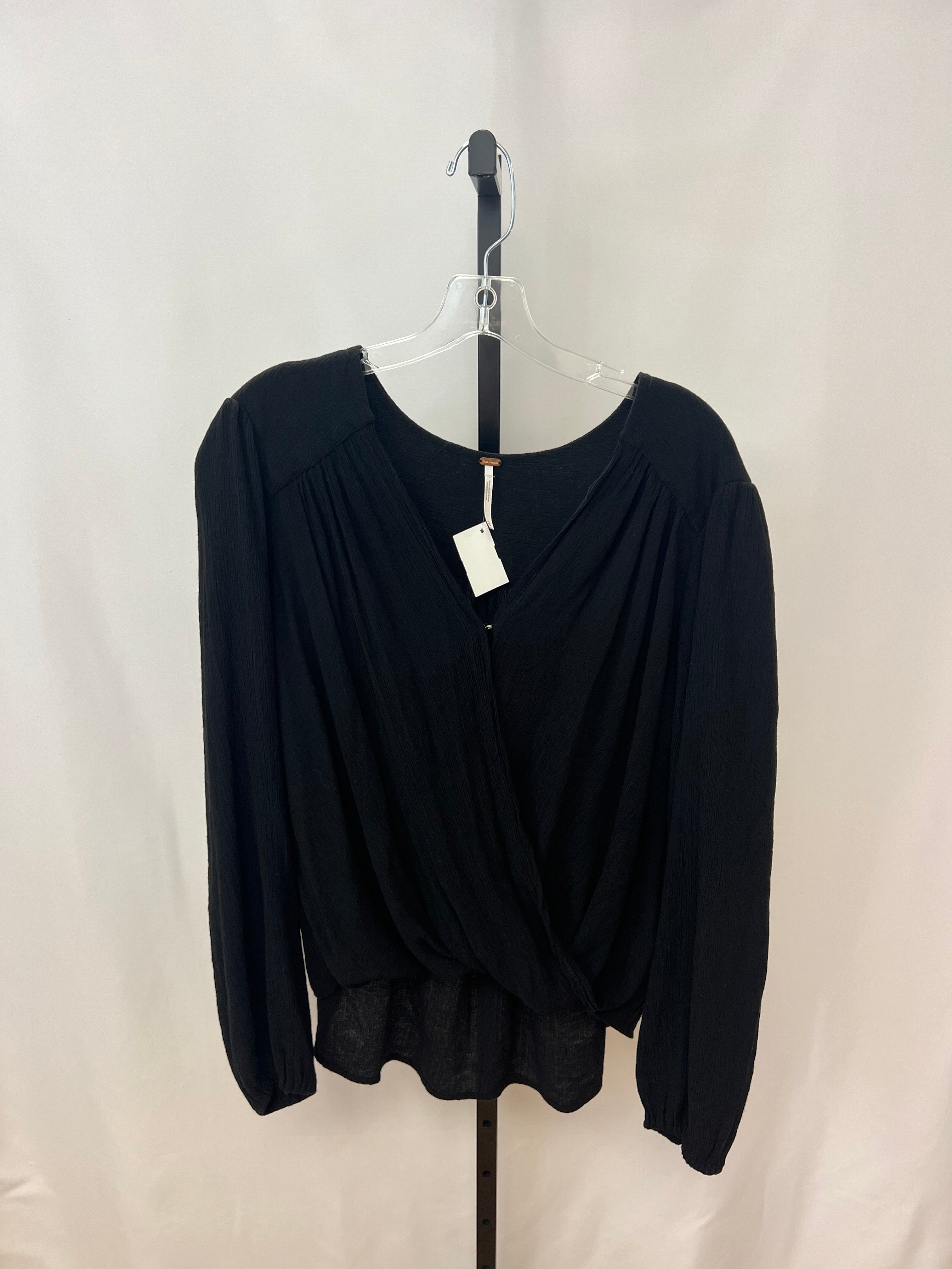 Free people black long sleeve size L