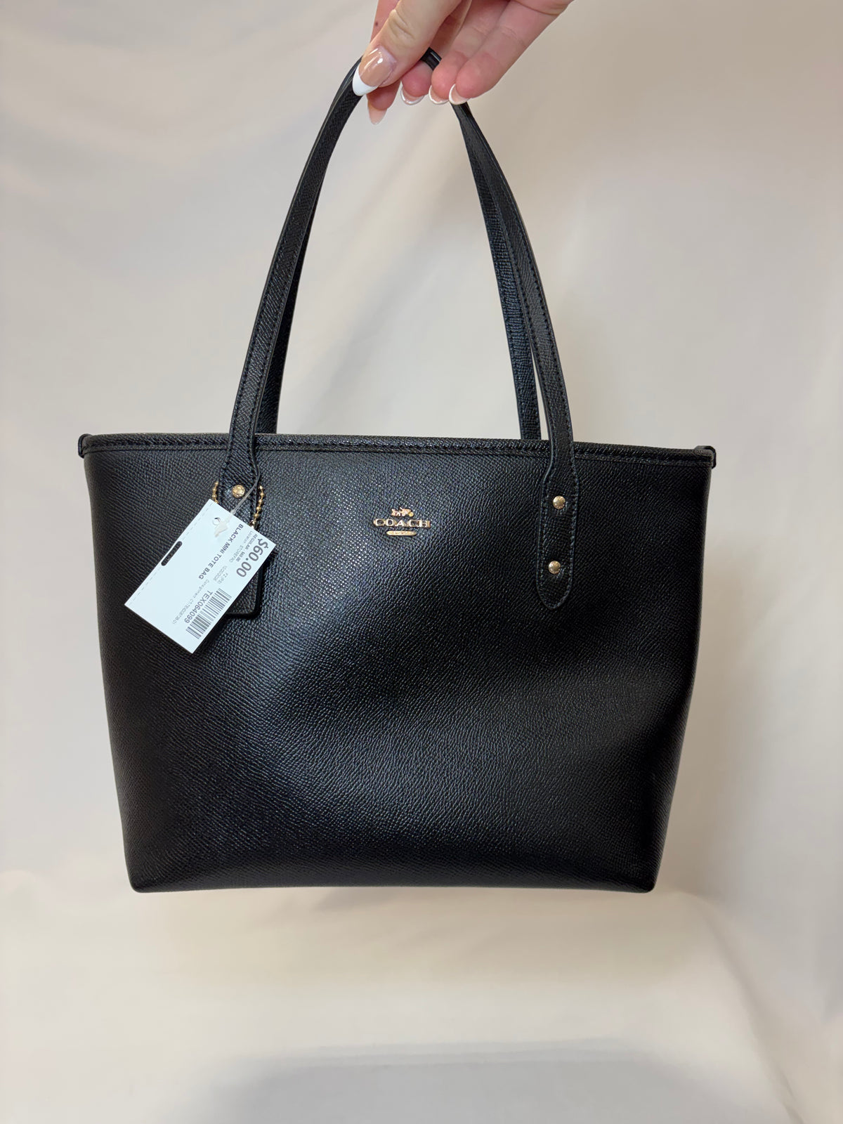 Coach black mini tote bag gently-used