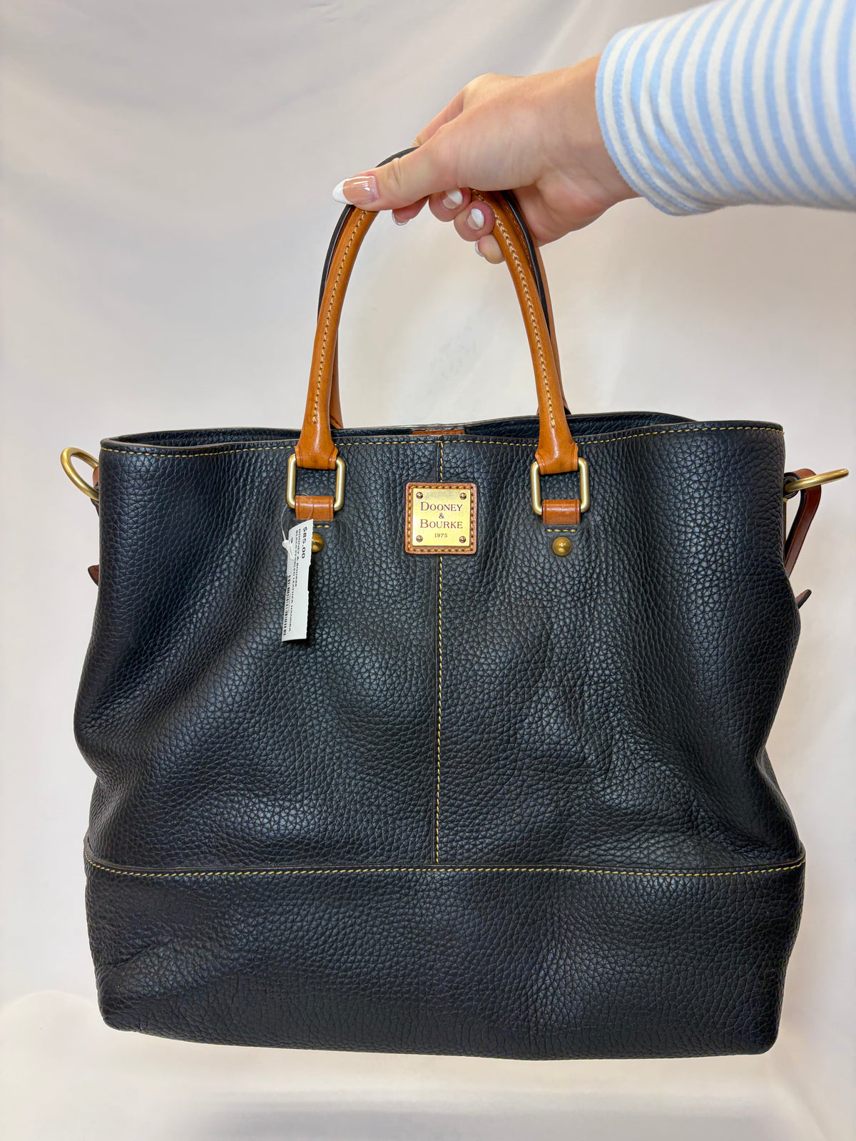 Dooney & Bourke black pebbled leather handbag gently-used