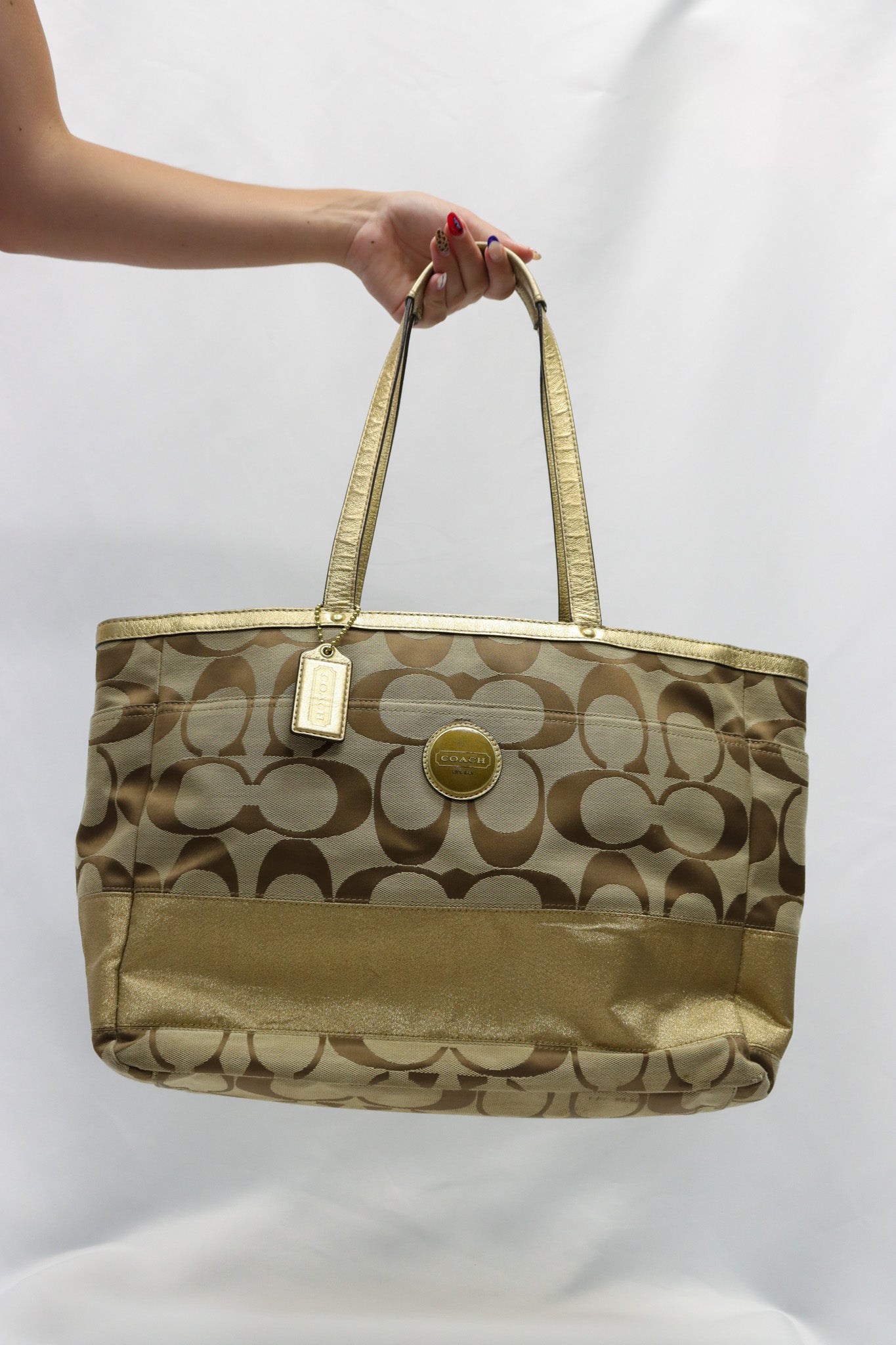 Coach Gold Diaper Bag